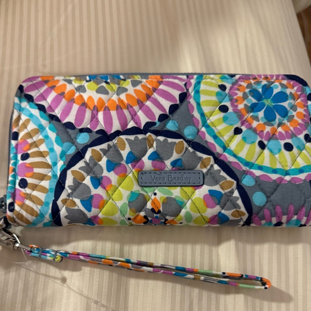 Vera Bradley Accordion wristlet.